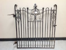 An antique wrought iron gate, width 91 cm.