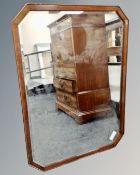 An Edwardian mahogany bevelled mirror