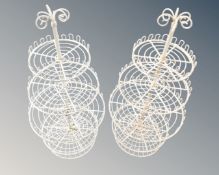 A pair of wire metal four tier cake stands