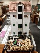 A folk art four tier farmhouse with lift and accessories