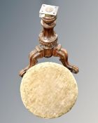 A Victorian circular dressing table stool on three way support