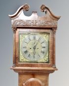 A 19th century mahogany longcase clock with brass and silvered dial