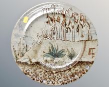 An Aurora project glazed pottery plate