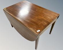 An early 20th century Scandinavian mahogany flap sided coffee table