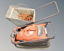 A Flymo Vision compact 350 electric lawn mower with lead together galvanised garden barrow