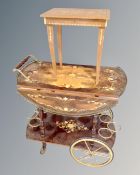 An Italian style flap sided two tier drinks trolley together with musical occasional table