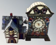 Two contemporary Tiffany style table lights in the form of a mantel clock and cottage