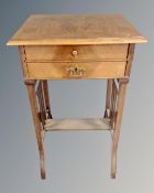A 19th century walnut two drawer hall table