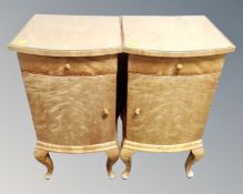 A pair of Edwardian maple veneered pot cupboards