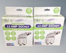 Four SMJ electrical outdoor powered 13 Amp sockets, boxed.