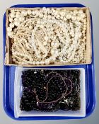 A tray of Mourning jewellery and simulated pearl necklaces