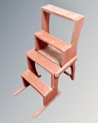 A painted library step/chair