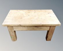 A chunky pine rectangular coffee table