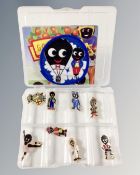 A set of eight Golly pin badges produced for Robertsons together with a sew on patch