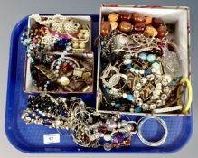 A tray containing a good collection of costume jewellery including bangles, necklaces,