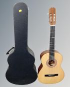 A Spanish acoustic guitar in carry case