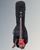 A Bass Centre electric bass guitar in carry bag