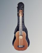 A Countryman model UB electric bass ukulele in carry bag