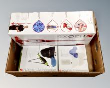 A Thane H2O X5 steam cleaner together with two accessory packs, all parts boxed.