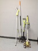 A Ryobi Easi-edge electric strimmer together with a small bundle of garden tools