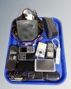A tray containing various electricals and mobile phones including Bose Soundlink speaker,