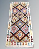 A Chobi kilim runner 146cm by 65cm