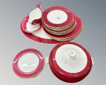 26 pieces of Wedgwood Burgundy gilt rimmed dinner china including a lidded tureen.