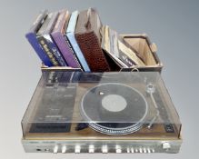 A vintage Ferguson Studio 400 music centre together with a box containing vinyl records.