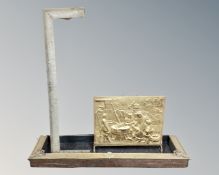 A 19th century Art Nouveau copper and brass fire curb together with a further fire curb and a brass