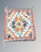 A Chobi kilim 48cm by 46cm