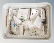 A Curver caddy containing 18 light switches.