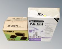 An Acoustic Solutions AS 133 home theatre system together with a three piece Iowa speaker set,