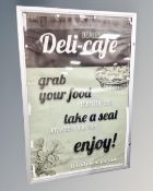 A metal framed wall mounted display board.