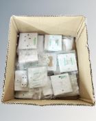 A box containing assorted boxed switches and sensors.