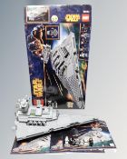 A Lego Star Wars 75055 Imperial Star Destroyer with mini-figures, box and instructions.