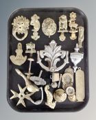 A tray of brass door knockers