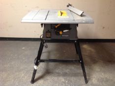 A Titan TTB 763 TAS 1500W table saw on stand