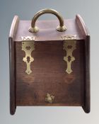 A 19th century oak coal receiver with brass fittings and handle