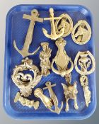 A tray of brass door knockers