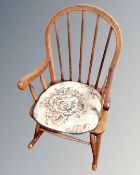 A child's beech rocking chair