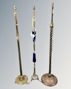 An antique twist column standard lamp together with two further standard lamps