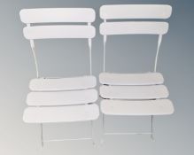 Two folding metal chairs