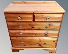 A Ducal pine five drawer chest