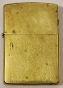 A Zippo lighter: 60th anniversary model gold coloured 1932-1992.