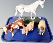 A Royal Doulton figure of Desert Orchid on wooden plinth together with a further Beswick figure -