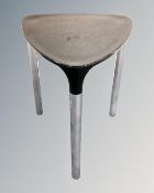 A Gedy Yannis tripod stool on chrome legs.