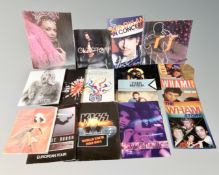 A box of concert programmes and books relating to music, Bob Dylan, Rolling Stones,