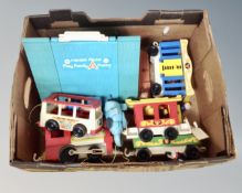 A box of vintage Fisher Price Play Family A-frame,
