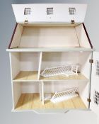 A 19th century style dolls house together with a box of dolls and furniture