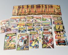 A tray of comics, DC Showcase and Daredevil 12¢ issues, The Amazing Spiderman 15¢,